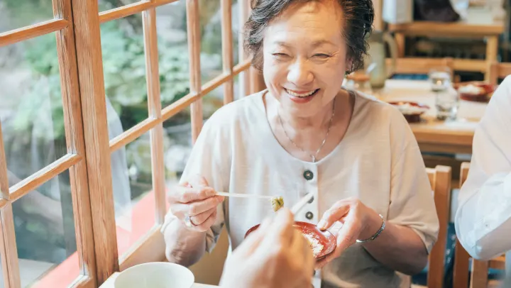 elderly woman eating